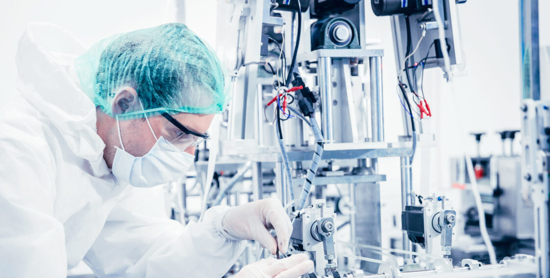 Medical worker working on a metrology machine